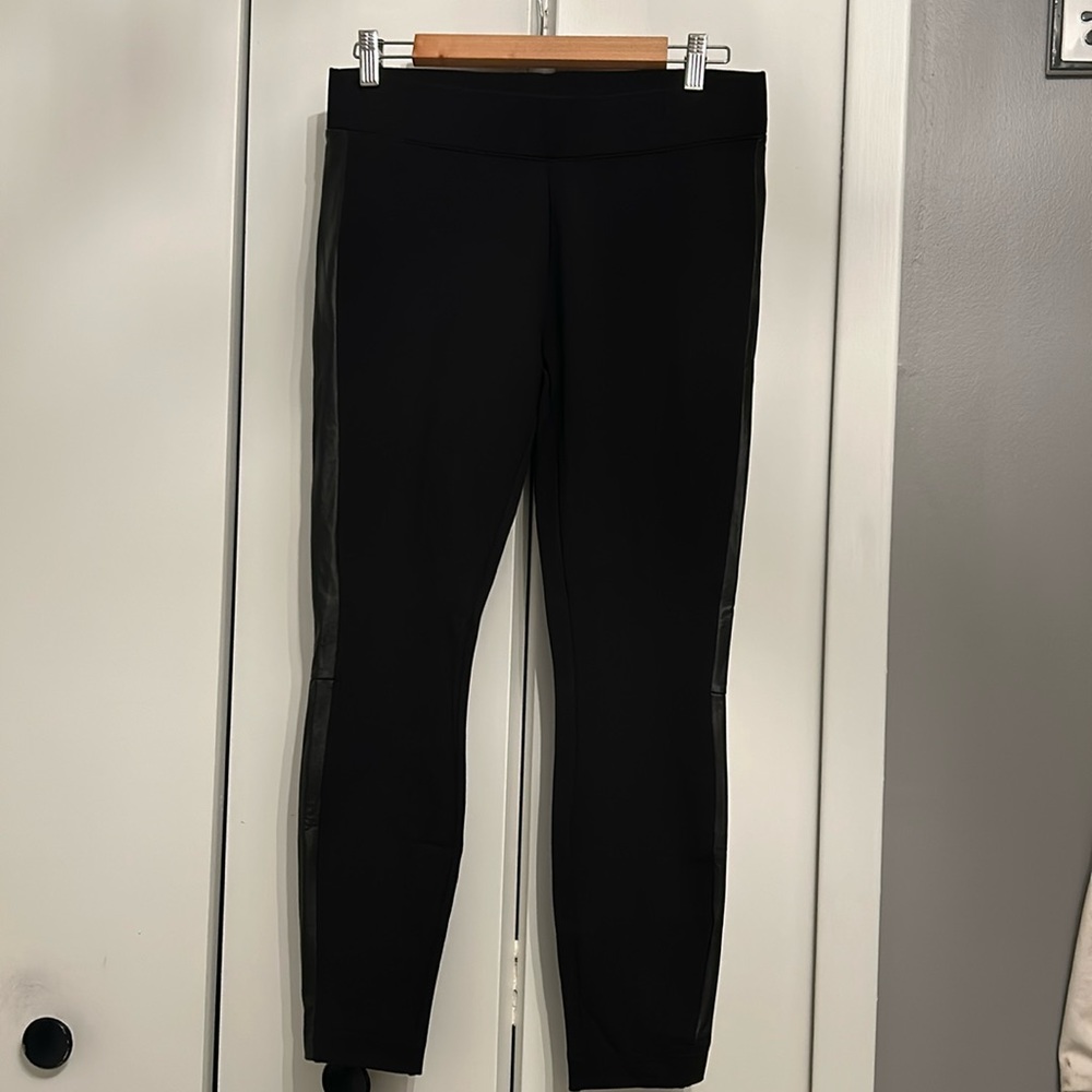 White House Black Market Ponte leggings with faux leather panels. Size small